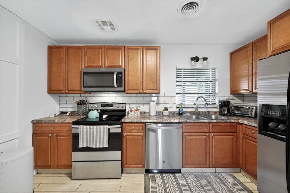 Fully stocked kitchen with coffee maker and all appliances for your convenience