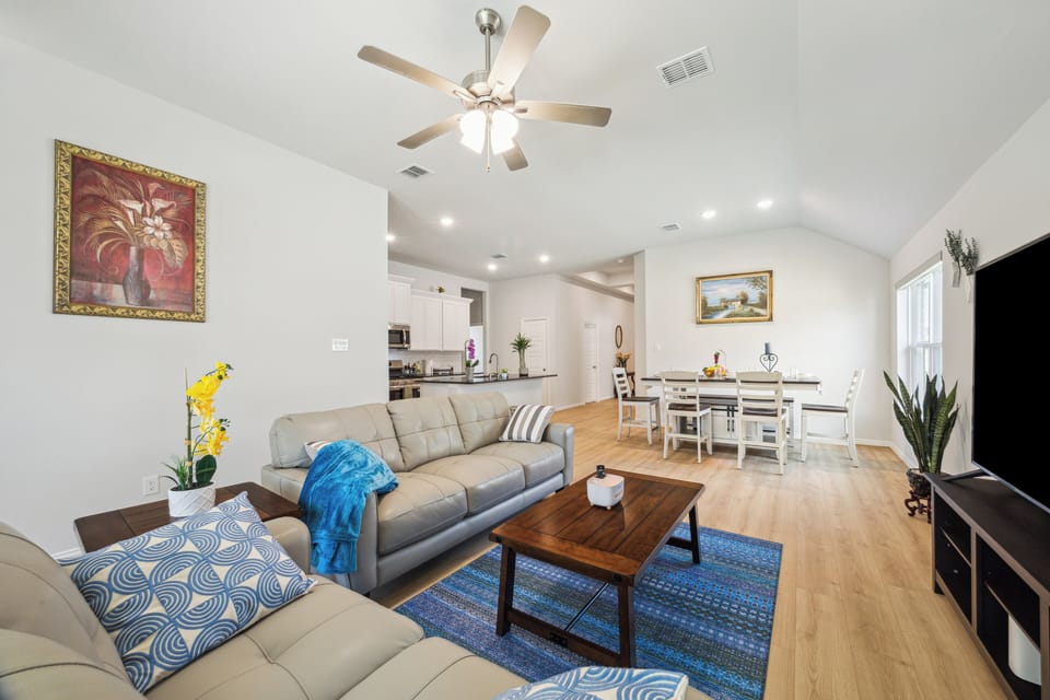 Living room with new sofa set and tv