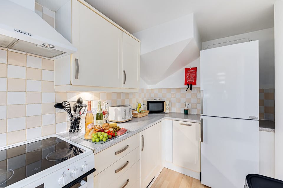 Enjoy a fully equipped kitchen stocked with everything you need to create home-cooked meals.