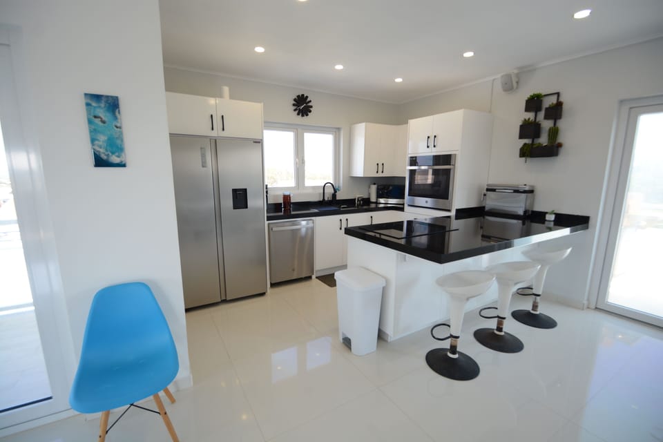 Gourmet kitchen with counter seating