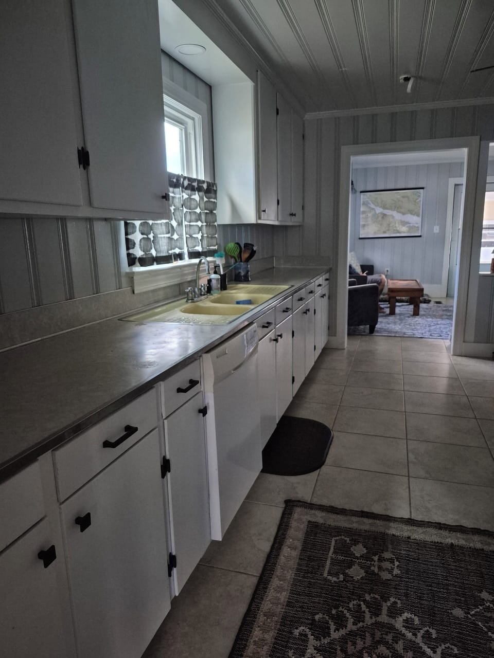Fully equipped kitchen with dining table.