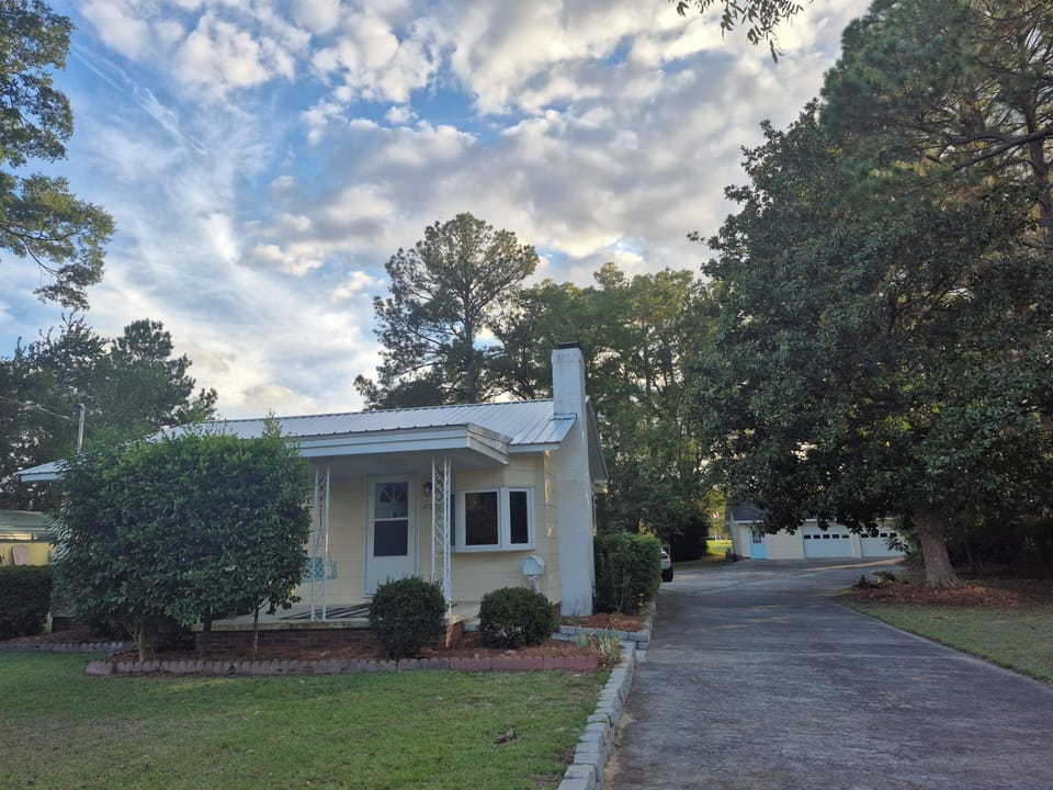 Front view of home and driveway. 