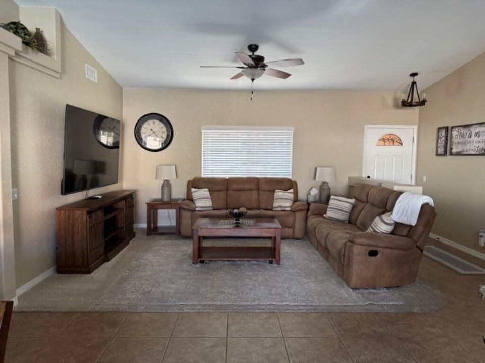 Cozy living room with plush seating and entertainment center