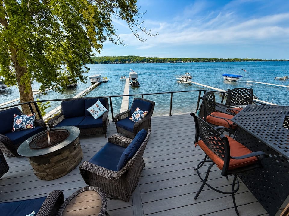 Outdoor dining at Bar Top for 4 and seating for 8 around the firepit! 