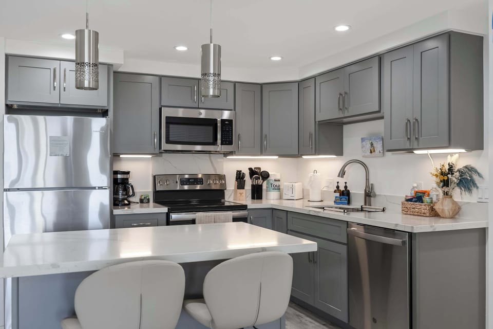 Cook, dine, and entertain effortlessly at your kitchen island with bar seating, set in a beautifully updated kitchen with stainless steel appliances.