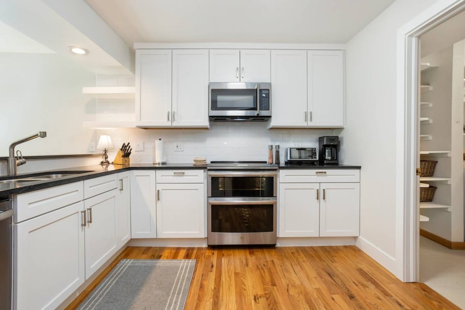 Kitchen is also stocked with a drip coffee maker, toaster oven, crock pot, blender, and mixer.