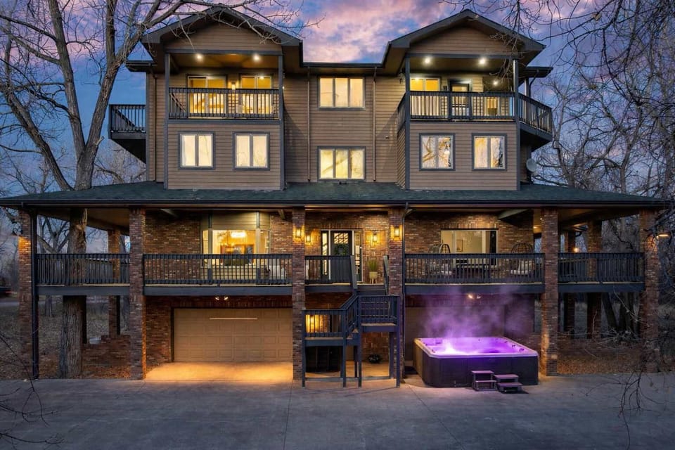 Take a relaxing soak in our large Swim Spa hot tub in your private backyard retreat.