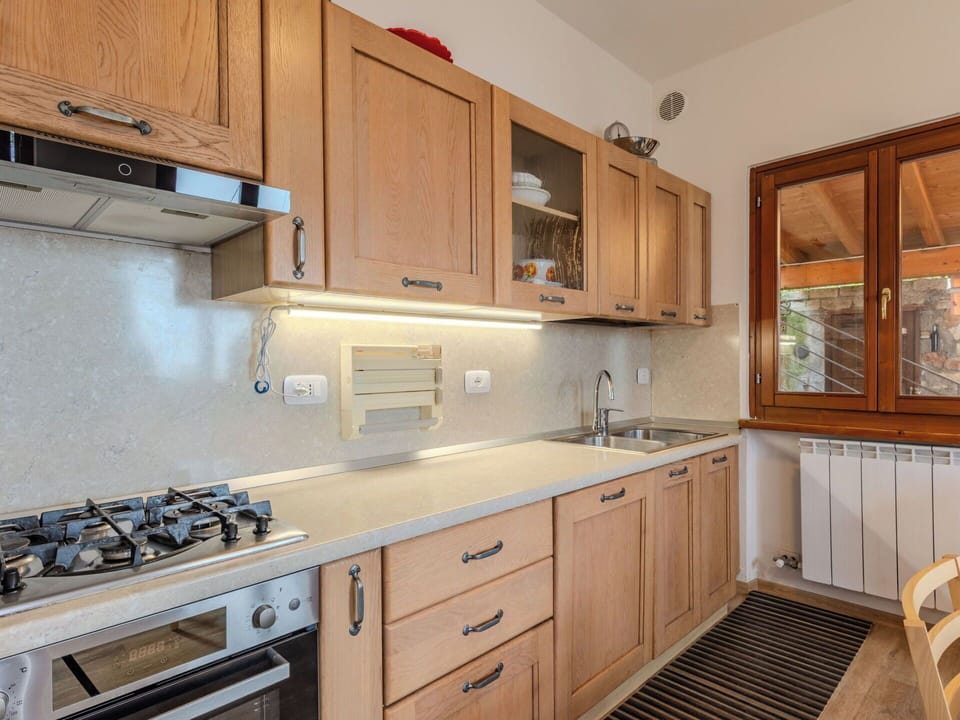 Kitchen, Countertop, Cabinetry, Kitchen Appliance, Major Appliance, Wood, Kitchen Sink, Furniture, Drawer, Cupboard