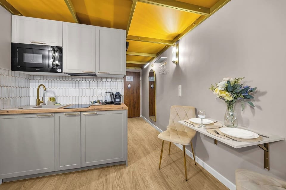 Cozy Studio with Sofa Bed and Mezzanine Bedroom | Book Now with RENTUJEMY