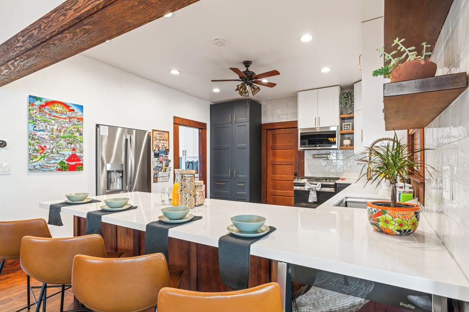 Enjoy casual dining by the kitchen counter with barstool seating. (Main House)