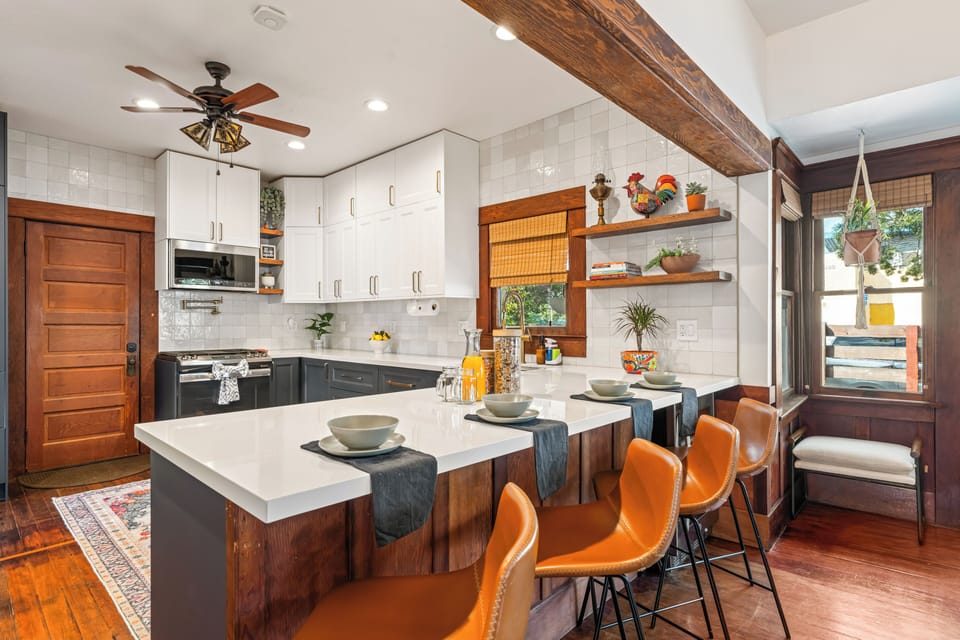 Enjoy casual dining by the kitchen counter with barstool seating. (Main House)