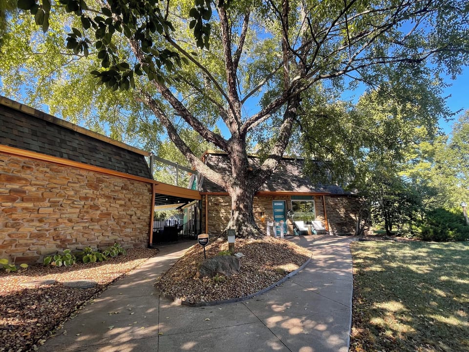 Walkway to our beatiful home!  Mature trees and incredible setting!