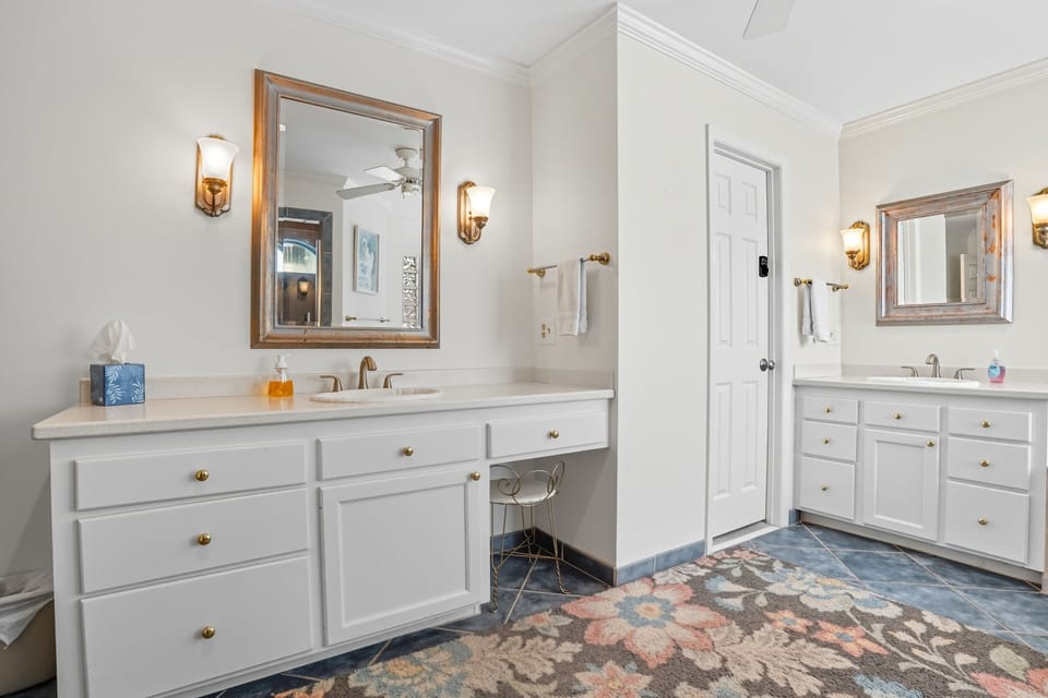 Ensuite Vanity & Dual Sinks - Elegant dual-sink vanity with custom lighting and ample counter space—part of the large primary ensuite designed for space, light, and ease.