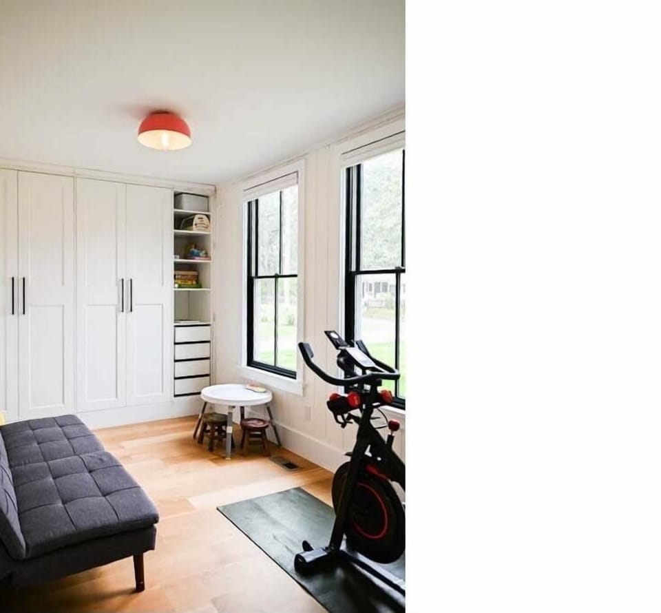 Flex room. Kid toys in built in cabinet. Perfect room for kids play time. 