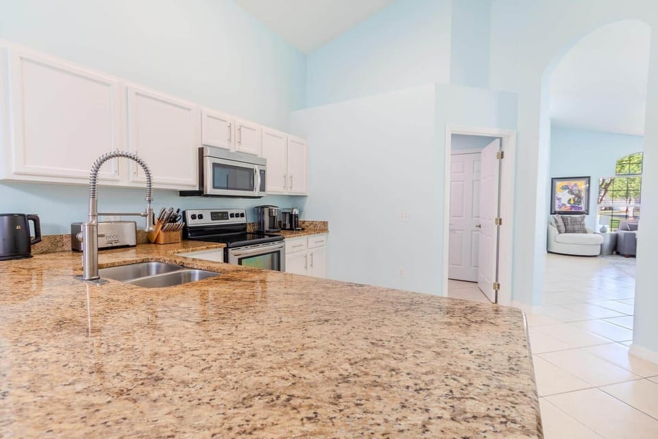Fully fitted kitchen with breakfast table