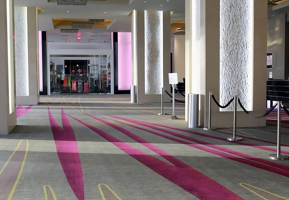 Arrive in style through a sleek, modern lobby entrance.