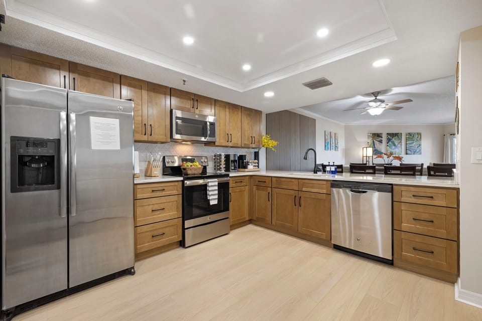 New completely renovated full stocked kitchen with quartz counter tops.