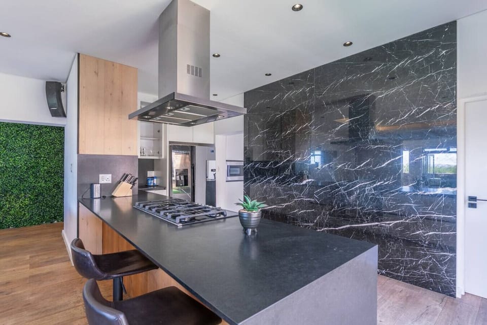 Cozy modern kitchen ideal for preparing home-style meals.