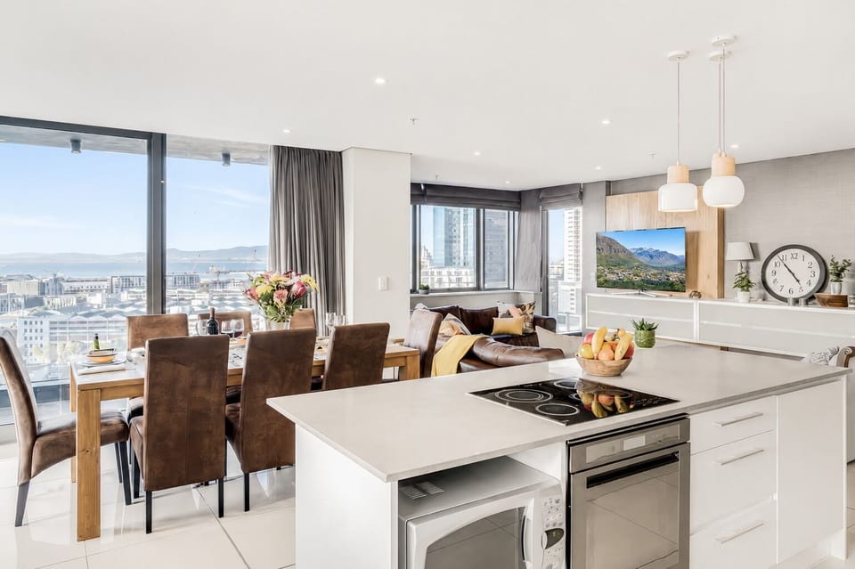 Spacious kitchen and dining area with lounge comfort and harbor views
