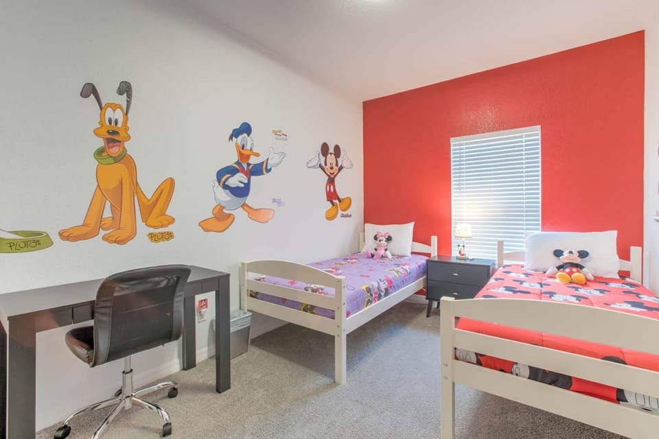 Themed Bedroom with desk and 2 single beds