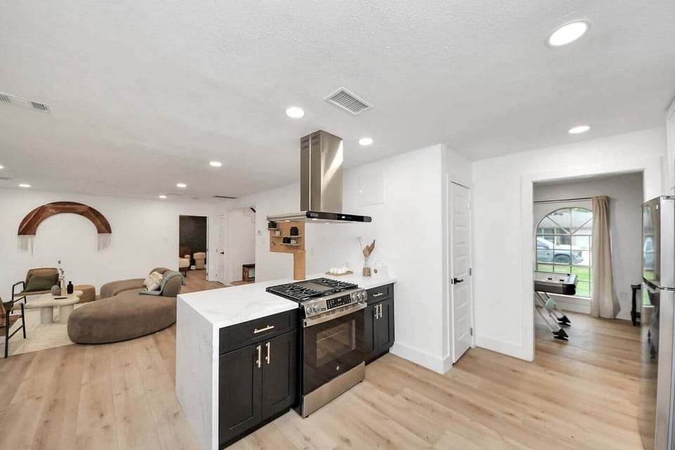 Open-concept design lets you prep meals while still being part of the fun in the living area.