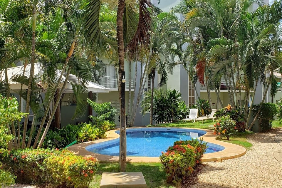 outdoor showers and two pools to cool off after a day at the beach.