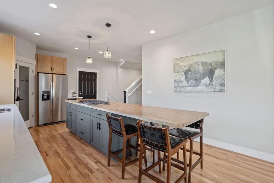 Spacious kitchen island with seating.