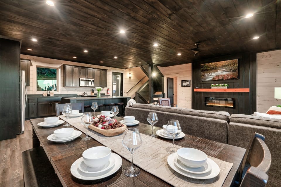 The dining area has plentiful seating for 8, making this cabin perfect to enjoy a home cooked meal after a day hiking the smoky mountain. 