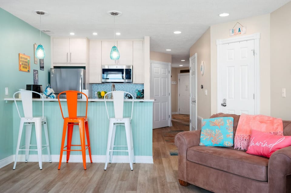 An open-concept living space designed for comfort and coastal charm. 🛋️✨