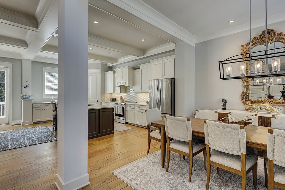 Dining table featuring 8 chairs.