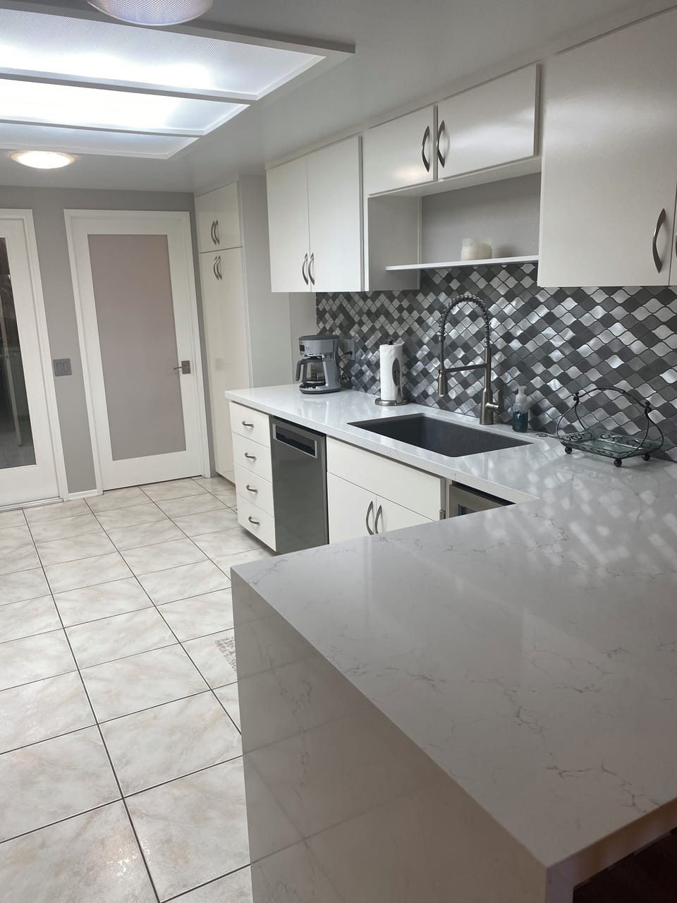 full laundry room off of kitchen and access to attached garage