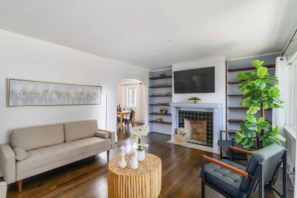 Step into our bright and welcoming living room, a cozy space to relax and soak in the natural light.