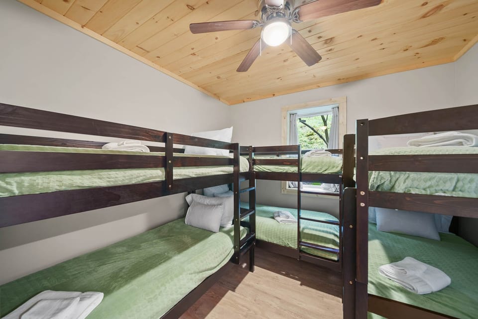 Bottom Level Bunk Room with Three Twin-Over-Twin Bunks