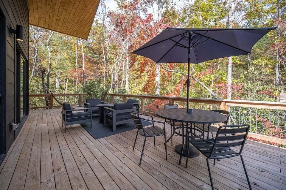 Open Deck with Dining Table, Fire Table, and Grill