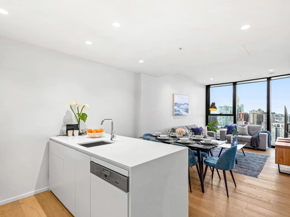 Enjoy open plan living in the spacious apartment, connecting the kitchen, dining and living spaces.