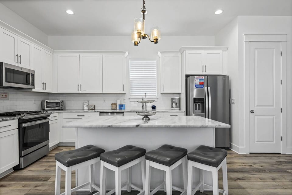 The kitchen offers bar seating for four