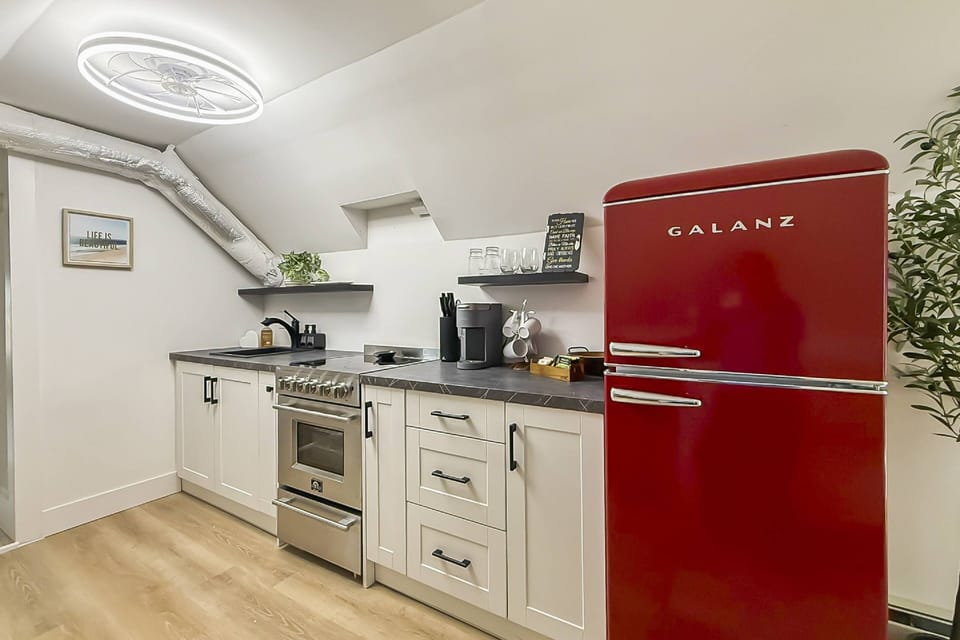 Retro kitchen with Keurig coffee machine, started coffee and everything you need to dine in.