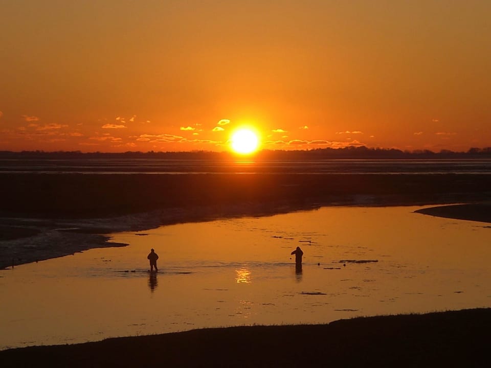 Fishermen at sunset