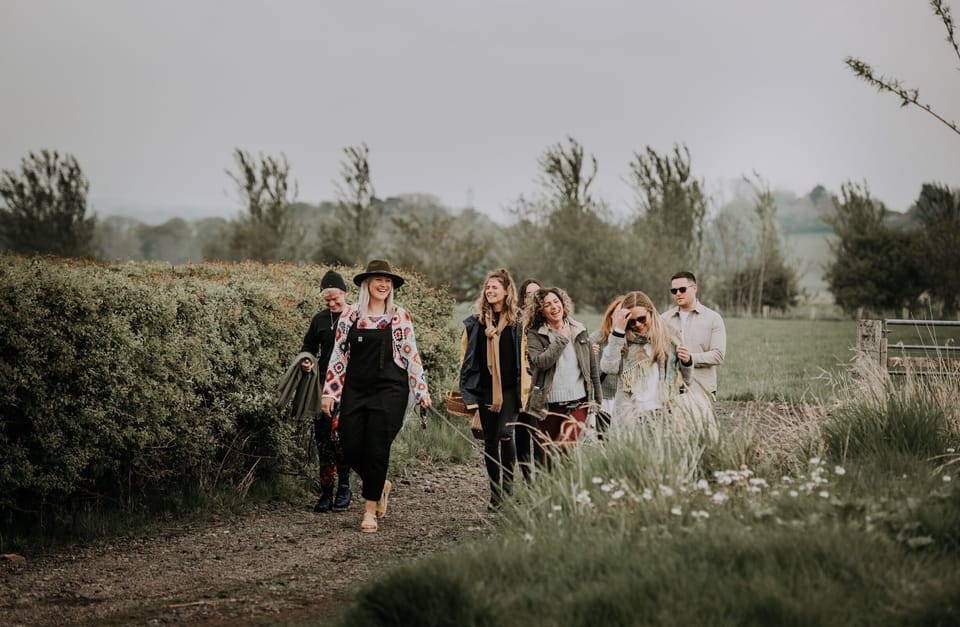 Group of friends walking the nature trail at Pattys Barn