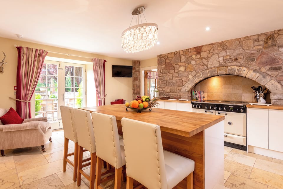 Open the French doors to the garden area