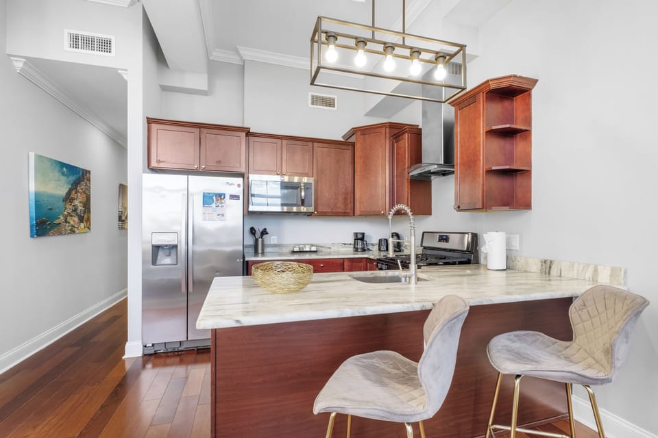 Modern kitchen design with ample counter space and full-size appliances throughout.