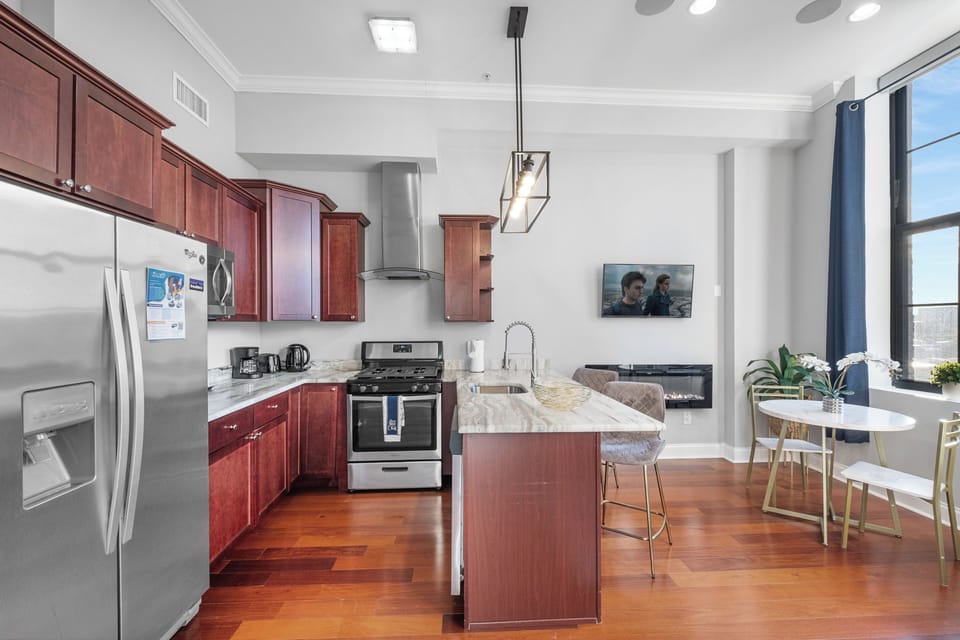 Full-size refrigerator, gas range, microwave, and dishwasher—everything you need for home-cooked meals.