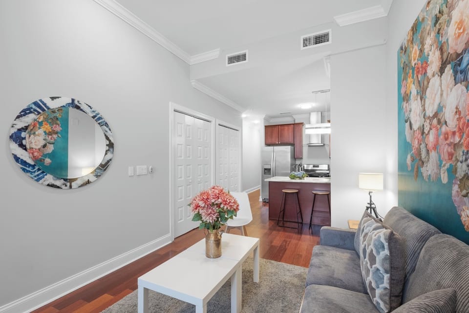 Modern furnished living room and a lovely dinner to compliment.
