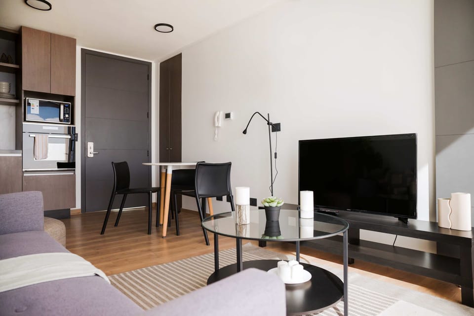 Cozy modern living room with sleek design, perfect for relaxation and entertainment.
