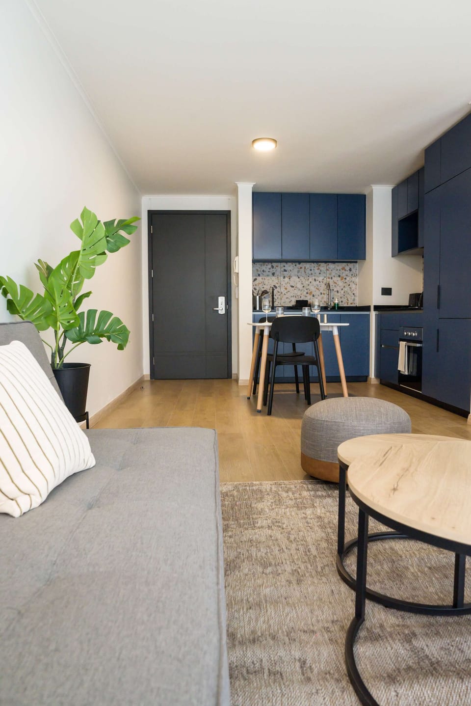 Stylish studio with modern kitchen and cozy living area, ideal for a city escape.