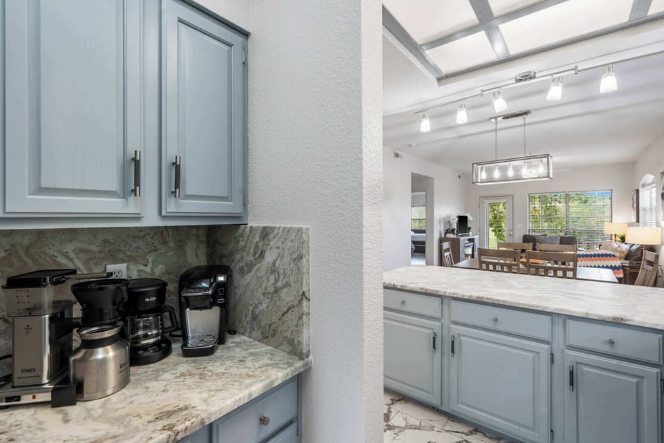 The open kitchen offers ample space & all the comforts of home​