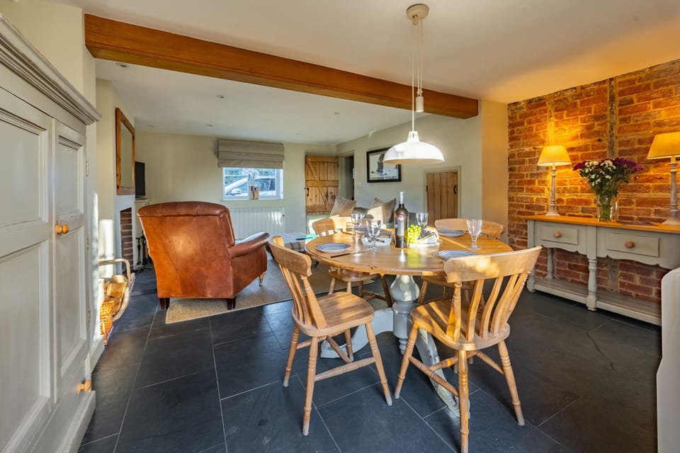 Ground floor: The round dining table has seating for four