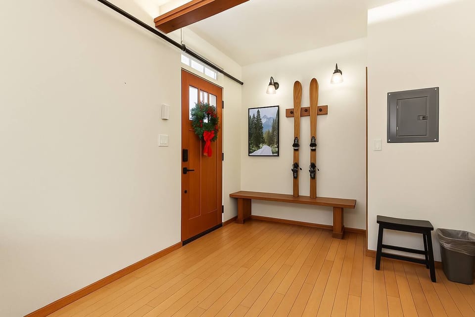 Step into comfort — a bright, cozy entry with winter charm