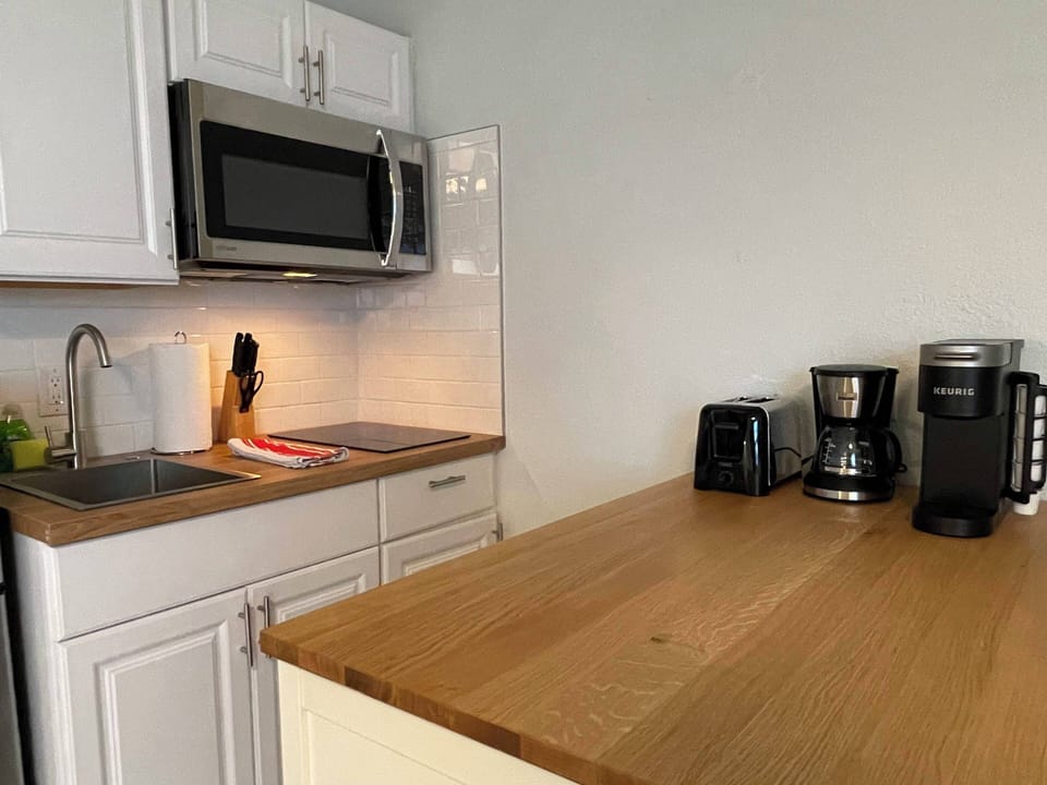 A stylish dining area — perfect for quick meals or morning coffee.