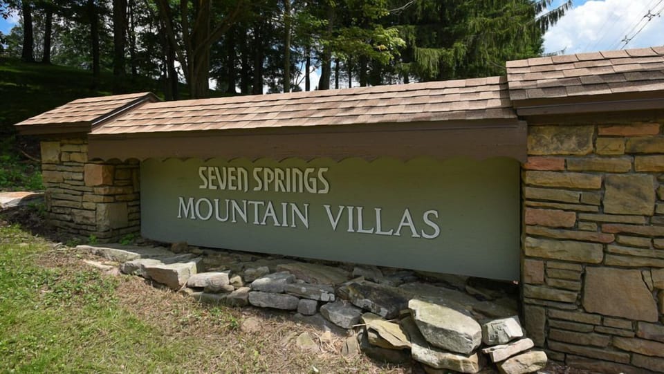 Welcome sign that greets you with a warm mountain welcome, setting the tone for a peaceful getaway in the Laurel Highlands.